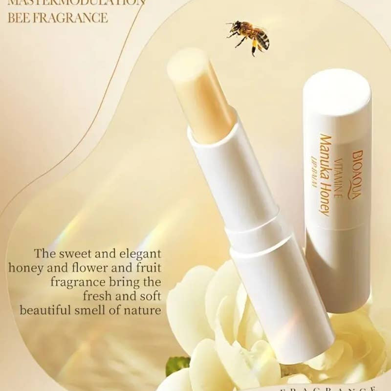 Lip balm with honey and flower design, featuring a bee and floral elements on a beige background.