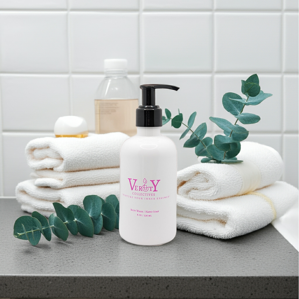 Bottle of 'Very' hand cream on a bathroom counter with towels and eucalyptus leaves.