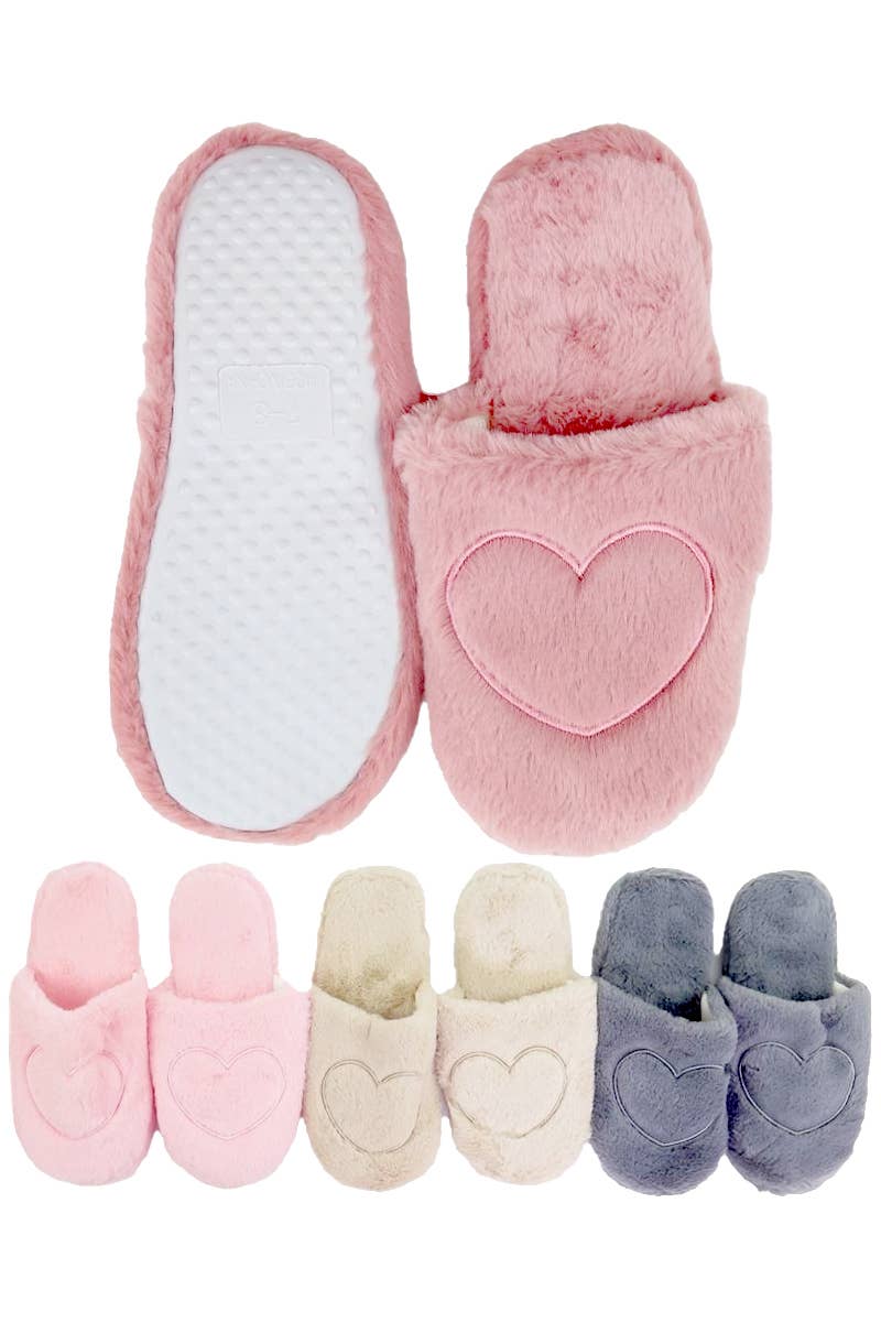 Set of pink, beige, and gray slippers with heart designs on a white background