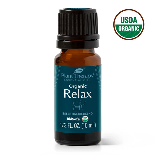 organic relax essential oil against white background