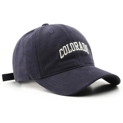 Navy blue cap with 'Colorado' text on a white background