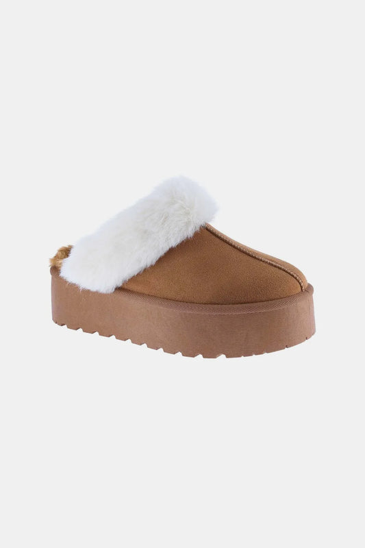 Brown fur slippers with thick brown soles