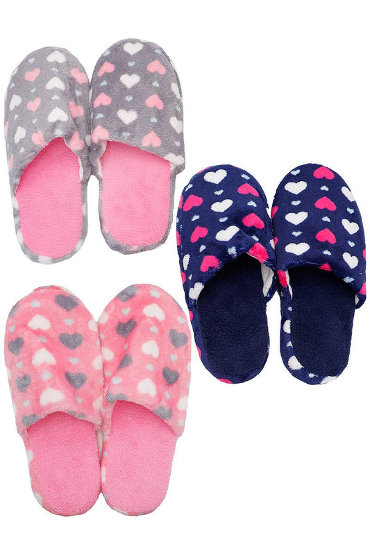 Pair of pink heart-patterned slippers and a pair of navy blue heart-patterned slippers on a white background.