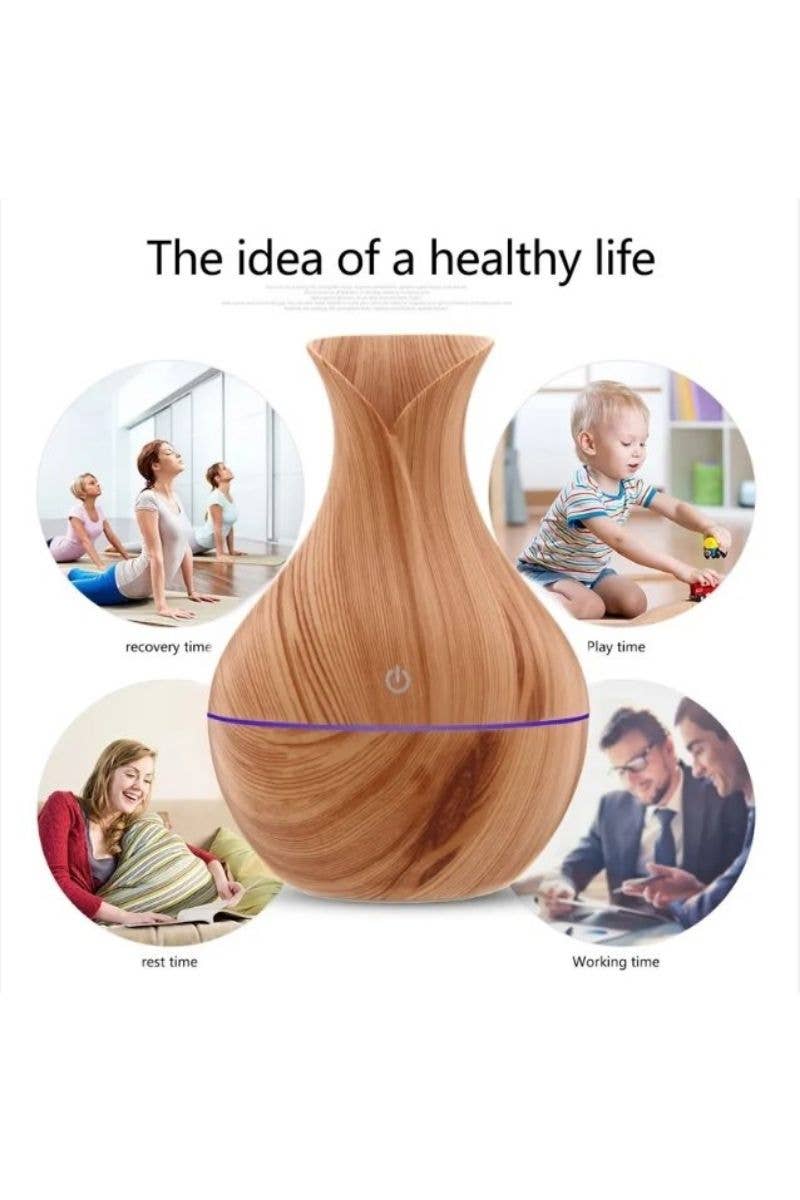 light wood humidifier showing pictures of yoga, child playing, resting, and working against white background