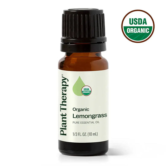 organic lemongrass essential oil against white background
