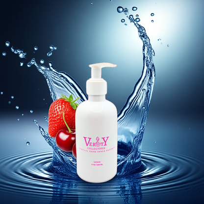 White bottle with pump, strawberries, and water splash on a blue background