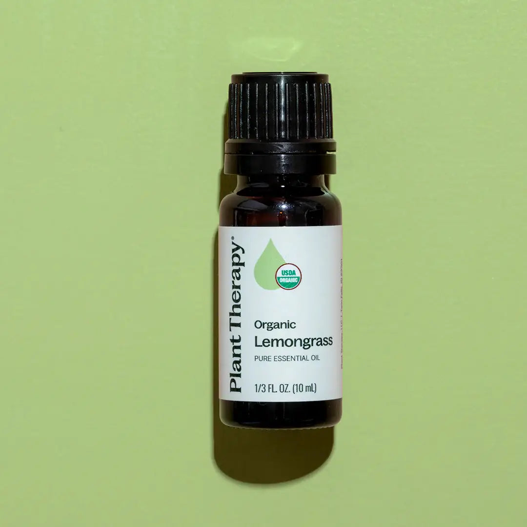 lemongrass oil with light green background