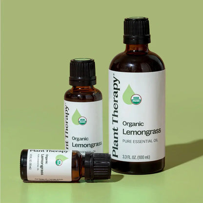 three different sizes bottle of organic lemongrass against light green background