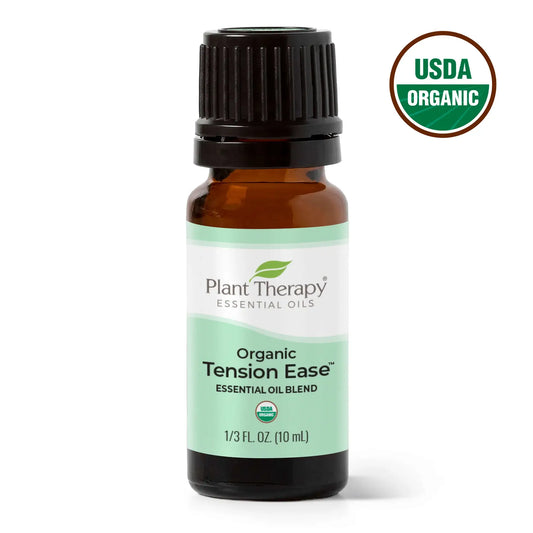 essential oil for tension ease against white background